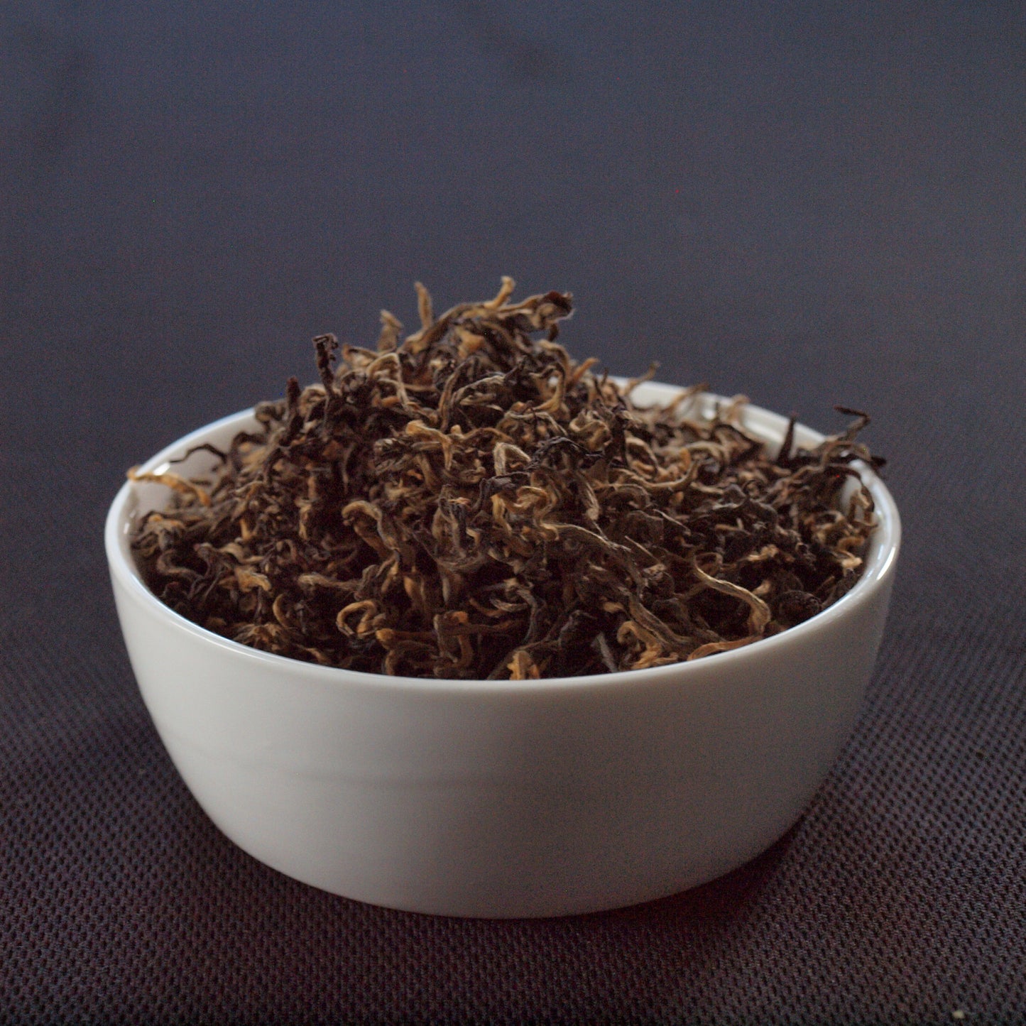 loose leaf tea, black tea, specialty tea, tea in a white dish